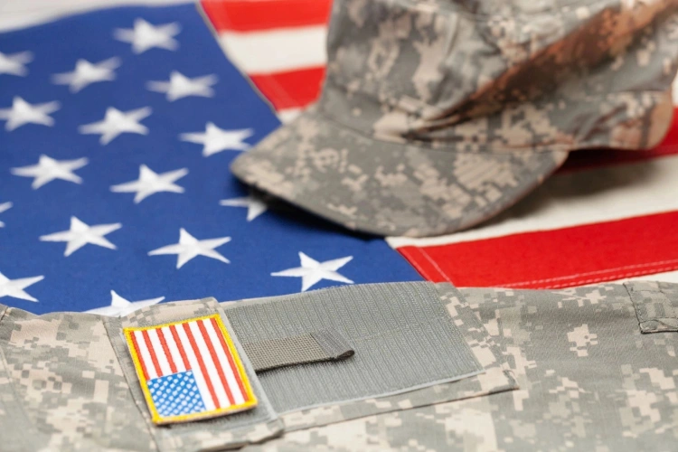 A close up of the american flag and hat